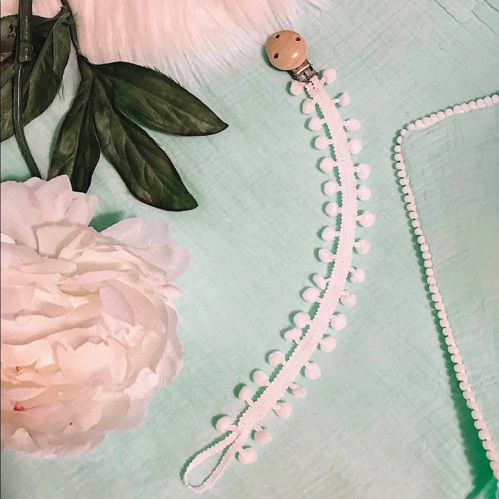 Pom pom pacifier holder
